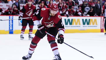 Feb 15, 2016; Glendale, AZ, USA; Arizona Coyotes defenseman Jarred Tinordi (28) shoots the puck during the second period against the Montreal Canadiens at Gila River Arena. Mandatory Credit: Matt Kartozian-USA TODAY Sports