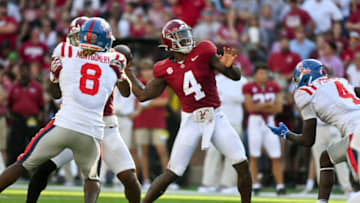 Sep 23, 2023; Tuscaloosa, Alabama, USA; Alabama Crimson Tide quarterback Jalen Milroe (4) throws for a touchdown against Mississippi at Bryant-Denny Stadium. Alabama defeated Mississippi 24-10. Mandatory Credit: Gary Cosby Jr.-USA TODAY Sports