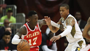 Feb 28, 2018; Atlanta, GA, USA; Atlanta Hawks guard Dennis Schroder (17) drives against Indiana Pacers guard Joe Young (3) during the second quarter at Philips Arena. Mandatory Credit: Jason Getz-USA TODAY Sports