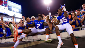 JACKSONVILLE, FL - OCTOBER 29: Teez Tabor #31, Duke Dawson #7, and Chris Thompson #85 of the Florida Gators celebrate after the game against the Georgia Bulldogs at EverBank Field on October 29, 2016 in Jacksonville, Florida. (Photo by Rob Foldy/Getty Images)