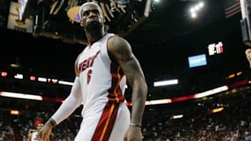 Mar 24, 2013; Miami, FL, USA; Miami Heat small forward LeBron James (6) reacts after a dunk against the Charlotte Bobcats in the second half at the American Airlines Arena. The Heat won 109-77. Mandatory Credit: Robert Mayer-USA TODAY Sports