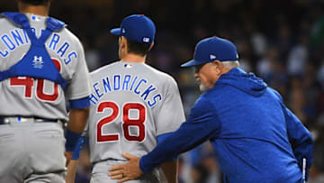 LOS ANGELES, CA - JUNE 27: Willson Contreras #40 looks on as manager Joe Maddon #70 pulls starting pitcher Kyle Hendricks #28 of the Chicago Cubs in the third inning of the game against the Los Angeles Dodgers at Dodger Stadium on June 27, 2018 in Los Angeles, California. (Photo by Jayne Kamin-Oncea/Getty Images)