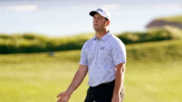 Feb 4, 2021; Scottsdale, Arizona, USA; Jon Rahm reacts after his putt on the 18th green during round one of the Waste Management Phoenix Open at TPC Scottsdale. Mandatory Credit: Rob Schumacher/The Arizona Republic-USA TODAY Sports