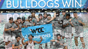The Gonzaga Bulldogs celebrate on the court after their 88-78 victory over the Brigham Young Cougars to win the championship game of the West Coast Conference basketball tournament at the Orleans Arena on March 9, 2021 in Las Vegas, Nevada. (Photo by Ethan Miller/Getty Images)
