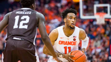 SYRACUSE, NY - DECEMBER 29: Oshae Brissett #11 of the Syracuse Orange handles the ball during the second half against Melkisedek Moreaux #12 of the St. Bonaventure Bonnies at the Carrier Dome on December 29, 2018 in Syracuse, New York. Syracuse defeats St. Bonaventure 81-47. (Photo by Brett Carlsen/Getty Images)