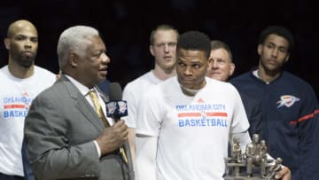 Oscar Robertson and Russell Westbrook. (Photo by J Pat Carter/Getty Images)