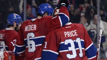 Oct 29, 2016; Montreal, Quebec, CAN; Montreal Canadiens defenseman Shea Weber (6) and teammate Carey Price (31) react after defeating the Toronto Maple Leafs 2-1 at the Bell Centre. Mandatory Credit: Eric Bolte-USA TODAY Sports