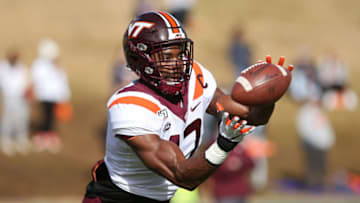 CHARLOTTESVILLE, VA - NOVEMBER 29: Divine Deablo #17 of the Virginia Tech Hokies warms up before the start of a game against the Virginia Cavaliers at Scott Stadium on November 29, 2019 in Charlottesville, Virginia. (Photo by Ryan M. Kelly/Getty Images)