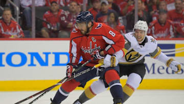 WASHINGTON, DC - OCTOBER 10: Washington Capitals left wing Alex Ovechkin (8), left, and Vegas Golden Knights defenseman Brayden McNabb (3) vie fortune puck uring a game between the Washington Capitals and the Vegas Golden Knights on October 10, 2018, in Washington, DC. (Photo by John McDonnell/The Washington Post via Getty Images)