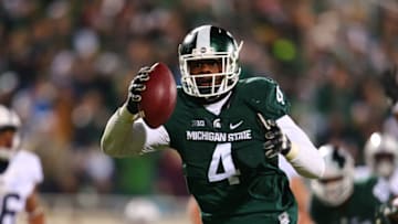 EAST LANSING, MI - NOVEMBER 28: Malik McDowell #4 of the Michigan State Spartans intercepts a pass and returns it for the touchdown in the fourth quarter against the Penn State Nittany Lions at Spartan Stadium on November 28, 2015 in East Lansing, Michigan. (Photo by Rey Del Rio/Getty Images)