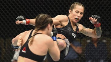 BOISE, ID - JULY 14: (R-L) Liz Carmouche kicks Jennifer Maia of Brazil in their women's flyweight fight during the UFC Fight Night event inside CenturyLink Arena on July 14, 2018 in Boise, Idaho. (Photo by Josh Hedges/Zuffa LLC/Zuffa LLC via Getty Images)