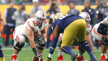 Jan 1, 2016; Glendale, AZ, USA; Ohio State Buckeyes center Jacoby Boren (50) against the Notre Dame Fighting Irish during the 2016 Fiesta Bowl at University of Phoenix Stadium. The Buckeyes defeated the Fighting Irish 44-28. Mandatory Credit: Mark J. Rebilas-USA TODAY Sports