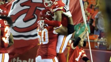 Aug 23, 2014; Kansas City, MO, USA; Kansas City Chiefs wide receiver Albert Wilson (8) celebrates with defensive tackle Jairus Campbell (60) after scorn a touchdown against the Minnesota Vikings in the second half at Arrowhead Stadium. Minnesota won the game 30-12. Mandatory Credit: John Rieger-USA TODAY Sports