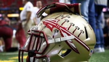 Dec 31, 2015; Atlanta, GA, USA; Detailed view of Florida State Seminoles helmet on the sidelines before a game against the Houston Cougars in the 2015 Chick-fil-A Peach Bowl at the Georgia Dome. Mandatory Credit: Brett Davis-USA TODAY Sports