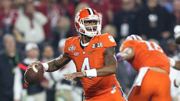Jan 11, 2016; Glendale, AZ, USA; Clemson Tigers quarterback Deshaun Watson (4) sets to throw the ball during the first quarter against the Alabama Crimson Tide in the 2016 CFP National Championship at University of Phoenix Stadium. Mandatory Credit: Matthew Emmons-USA TODAY Sports