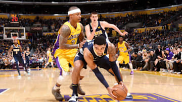 LOS ANGELES, CA - MARCH 13: Gary Harris #14 of the Denver Nuggets handles the ball against Isaiah Thomas #3 of the Los Angeles Lakers during the game between the two teams on March 13, 2018 at STAPLES Center in Los Angeles, California. NOTE TO USER: User expressly acknowledges and agrees that, by downloading and/or using this Photograph, user is consenting to the terms and conditions of the Getty Images License Agreement. Mandatory Copyright Notice: Copyright 2018 NBAE (Photo by Andrew D. Bernstein/NBAE via Getty Images)
