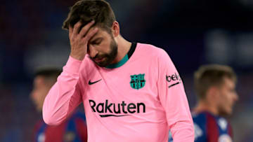 VALENCIA, SPAIN - MAY 11: Gerard Pique of FC Barcelona reacts during the La Liga Santander match between Levante UD and FC Barcelona at Ciutat de Valencia Stadium on May 11, 2021 in Valencia, Spain. Sporting stadiums around Spain remain under strict restrictions due to the Coronavirus Pandemic as Government social distancing laws prohibit fans inside venues resulting in games being played behind closed doors. (Photo by Quality Sport Images/Getty Images)