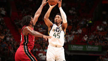 MIAMI, FL - DECEMBER 2: Donovan Mitchell #45 of the Utah Jazz shoots the ball against the Miami Heat on December 2, 2018 at American Airlines Arena in Miami, Florida. NOTE TO USER: User expressly acknowledges and agrees that, by downloading and or using this Photograph, user is consenting to the terms and conditions of the Getty Images License Agreement. Mandatory Copyright Notice: Copyright 2018 NBAE (Photo by Issac Baldizon/NBAE via Getty Images)