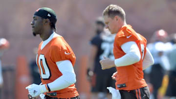 May 18, 2016; Berea, OH, USA; Cleveland Browns quarterback Robert Griffin (10) and quarterback Austin Davis (7) warm up during official training activities at the Cleveland Browns training facility. Mandatory Credit: Ken Blaze-USA TODAY Sports