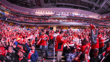 WASHINGTON, DC - APRIL 11: Washington Capitals fans stand prior to the game against the Carolina Hurricanes on April 11, 2019, at the Capital One Arena in Washington, D.C. in the first round of the Stanley Cup Playoffs. (Photo by Mark Goldman/Icon Sportswire via Getty Images)