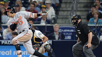 Jun 28, 2016; San Diego, CA, USA; Baltimore Orioles shortstop Manny Machado (13) hits a broken bat two RBI single during the sixth inning against the San Diego Padres at Petco Park. Mandatory Credit: Jake Roth-USA TODAY Sports