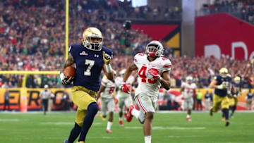 Jan 1, 2016; Glendale, AZ, USA; Notre Dame Fighting Irish wide receiver Will Fuller (7) runs for a touchdown against Ohio State Buckeyes linebacker Darron Lee (43) during the 2016 Fiesta Bowl at University of Phoenix Stadium. Mandatory Credit: Mark J. Rebilas-USA TODAY Sports