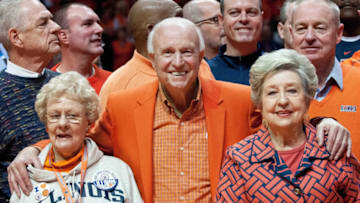 Jan 4, 2014; Champaign, IL, USA; Former Illinois Fighting Illini head coach Lou Henson (center) during halftime of the game against the Penn State Nittany Lions at State Farm Center. The 1989 "Flying Illini" Final Four team was honored during halftime. Illinois defeated Penn State 75-55. Mandatory Credit: Bradley Leeb-USA TODAY Sports