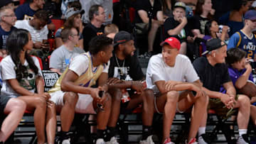 LAS VEGAS, NV - JULY 7: Donovan Mitchell, Royce O'Neale, and Dante Exum of the Utah Jazz speak during game between Portland Trail Blazers and Utah Jazz during the 2018 Las Vegas Summer League on July 7, 2018 at the Cox Pavilion in Las Vegas, Nevada. Copyright 2018 NBAE (Photo by David Dow/NBAE via Getty Images)