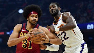 Nov 24, 2021; Cleveland, Ohio, USA; Cleveland Cavaliers center Jarrett Allen (31) drives to the basket against Phoenix Suns center Deandre Ayton (22) during the first quarter at Rocket Mortgage FieldHouse. Mandatory Credit: Ken Blaze-USA TODAY Sports