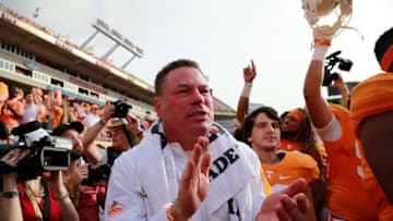 Jan 1, 2016; Tampa, FL, USA; Tennessee Volunteers head coach Butch Jones and teammates celebrate as they beat the Northwestern Wildcats in the 2016 Outback Bowl at Raymond James Stadium. Tennessee Volunteers defeated the Northwestern Wildcats 45-6. Tennessee Volunteers Mandatory Credit: Kim Klement-USA TODAY Sports