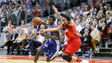 MUNICH, GERMANY - FEBRUARY 04: Isaac Bonga of Fraport Skyliners and Alex King of FC Bayern Muenchen battle for the ball during the game between FC Bayern Muenchen and the Fraport Skyliners at Audi Dome on February 4, 2017 in Munich, Germany. (Photo by TF-Images/Getty Images)