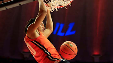 CHAMPAIGN, ILLINOIS - NOVEMBER 14: Ty Rodgers #20 of the Illinois Fighting Illini dunks in the first half against the Monmouth Hawks at State Farm Center on November 14, 2022 in Champaign, Illinois. (Photo by Justin Casterline/Getty Images)