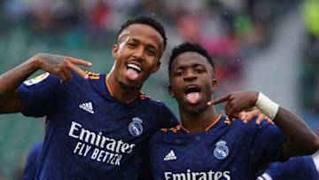 Real Madrid, Vinicius Junior, Eder Militao (Photo by JOSE JORDAN/AFP via Getty Images)