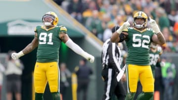 Green Bay Packers outside linebacker Preston Smith (91) and Green Bay Packers linebacker Rashan Gary (52) celebrate a sack Green Bay Packers outside linebacker Preston Smith (91) during the first half of the Green Bay Packers football game against the Washington Redskins at Lambeau Field in Green Bay on Sunday, Dec. 8, 2019. Photo by Mike De Sisti/Milwaukee Journal SentinelPackers09 Packers 02027