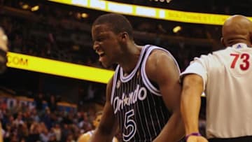 Feb 21, 2014; Orlando, FL, USA; Orlando Magic shooting guard Victor Oladipo (5) reacts after dunking the ball and drawing a foul with 30 seconds to go in double overtime as the Orlando Magic beat the New York Knicks 129-121 in double overtime at Amway Center. Oladipo finished with 30 points. Mandatory Credit: David Manning-USA TODAY Sports