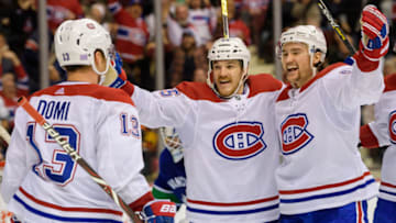 VANCOUVER, BC - NOVEMBER 17: Montreal Canadiens right Wing Andrew Shaw (65) celebrates with left Wing Jonathan Drouin (92) and center Max Domi (13) after scoring goal on Vancouver Canucks goaltender Jacob Markstrom (25) during their NHL game at Rogers Arena on November 17, 2018 in Vancouver, British Columbia, Canada. Monreal won 3-2. (Photo by Derek Cain/Icon Sportswire via Getty Images)