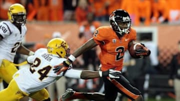Nov 3, 2012; Corvallis, OR, USA; Oregon State Beavers wide receiver Markus Wheaton (2) runs the ball past Arizona State Sun Devils cornerback Osahon Irabor (24) at Reser Stadium. Mandatory Credit: Scott Olmos-USA TODAY Sports