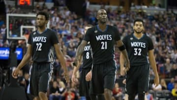 Nov 27, 2015; Sacramento, CA, USA; Minnesota Timberwolves guard Andrew Wiggins (22), guard Zach LaVine (8), forward Kevin Garnett (21) and center Karl-Anthony Towns (32) look on during a timeout against the Sacramento Kings during the third quarter at Sleep Train Arena. The The Timberwolves won 101-91. Mandatory Credit: Kelley L Cox-USA TODAY Sports