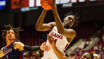 Dec 20, 2022; Tuscaloosa, Alabama, USA; Alabama Crimson Tide center Charles Bediako (14) grabs a rebound against the Jackson State Tigers during the second half at Coleman Coliseum. Mandatory Credit: Marvin Gentry-USA TODAY Sports