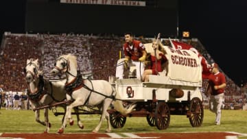 Sep 7, 2013; Norman, OK, USA; Oklahoma Sooners Schooner takes the field after a field goal was scored in the second half against West Virginia Mountaineers safety Karl Joseph (8) at Gaylord Family - Oklahoma Memorial Stadium. The Oklahoma Sooners beat the West Virginia Mountaineers 16-7. Mandatory Credit: Matthew Emmons-USA TODAY Sports