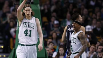 Mar 21, 2016; Boston, MA, USA; Boston Celtics point guard Isaiah Thomas (4) screams as center Kelly Olynyk (41) points after scoring a basket during the second quarter against the Orlando Magic at TD Garden. Mandatory Credit: Greg M. Cooper-USA TODAY Sports