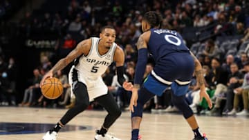 D'Angelo Russell and the Minnesota Timberwolves shut down Dejounte Murray and the San Antonio Spurs. Mandatory Credit: David Berding-USA TODAY Sports