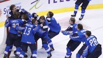 VANCOUVER , BC - JANUARY 5: Finland celebrates a victory against the United States following a gold medal game at the IIHF World Junior Championships at Rogers Arena on January 5, 2019 in Vancouver, British Columbia, Canada. (Photo by Kevin Light/Getty Images)