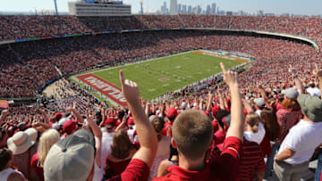 DALLAS, TX - OCTOBER 14: Fans cheer during the kickoff for the game between the Oklahoma Sooners and Texas Longhorns at Cotton Bowl on October 14, 2017 in Dallas, Texas. The Dallas skyline appears in the background. (Photo by Richard W. Rodriguez/Getty Images)