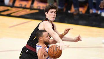 CLEVELAND, OH - JUNE 08: Cedi Osman #16 of the Cleveland Cavaliers defends a shot by Stephen Curry #30 of the Golden State Warriors during Game Four of the 2018 NBA Finals at Quicken Loans Arena on June 8, 2018 in Cleveland, Ohio. NOTE TO USER: User expressly acknowledges and agrees that, by downloading and or using this photograph, User is consenting to the terms and conditions of the Getty Images License Agreement. (Photo by Jason Miller/Getty Images)