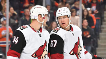 EDMONTON, AB - NOVEMBER 4: Carl Soderberg #34 and Lawson Crouse #67 of the Arizona Coyotes discuss the play during the game against the Edmonton Oilers on November 4, 2019, at Rogers Place in Edmonton, Alberta, Canada. (Photo by Andy Devlin/NHLI via Getty Images)
