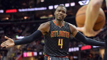 Apr 11, 2016; Cleveland, OH, USA; Atlanta Hawks forward Paul Millsap (4) complains about a call during the third quarter against the Cleveland Cavaliers at Quicken Loans Arena. The Cavs won 109-94. Mandatory Credit: Ken Blaze-USA TODAY Sports