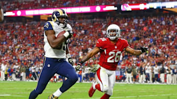 Nov 9, 2014; Glendale, AZ, USA; St. Louis Rams tight end Jared Cook (89) runs for a touchdown under pressure from Arizona Cardinals safety Rashad Johnson (26) in the second quarter at University of Phoenix Stadium. Mandatory Credit: Mark J. Rebilas-USA TODAY Sports