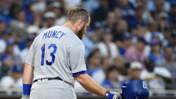 SAN DIEGO, CA - JULY 12: Max Muncy #13 of the Los Angeles Dodgers throws his helmet after striking out during the third inning of a baseball game against the San Diego Padres at PETCO Park on July 12, 2018 in San Diego, California. (Photo by Denis Poroy/Getty Images)