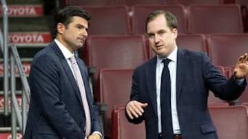 Oct 8, 2015; Philadelphia, PA, USA; Philadelphia 76ers general manager Sam Hinkie (R) talks with chief executive officer Scott O